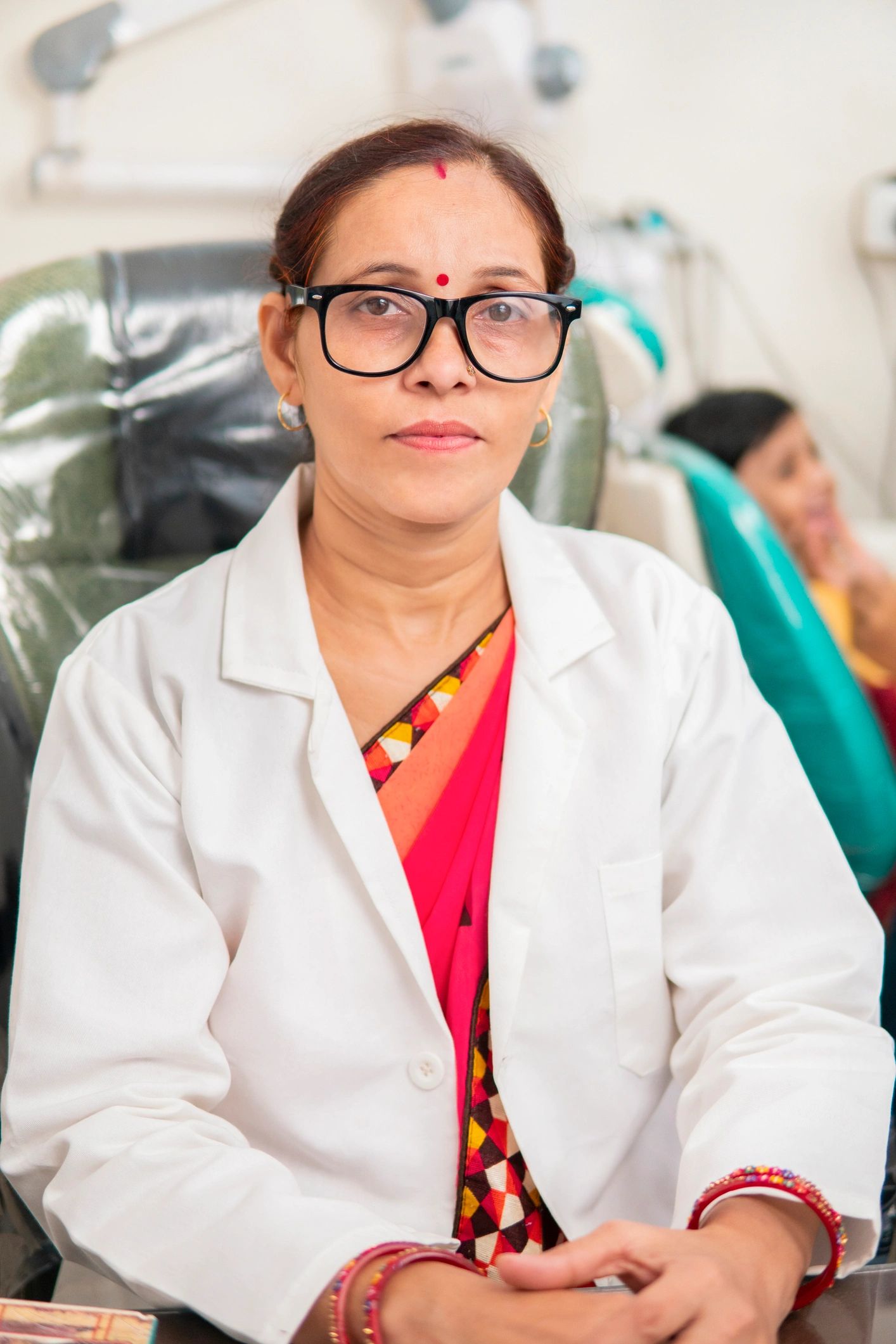 Portrait of female dentist at clinic