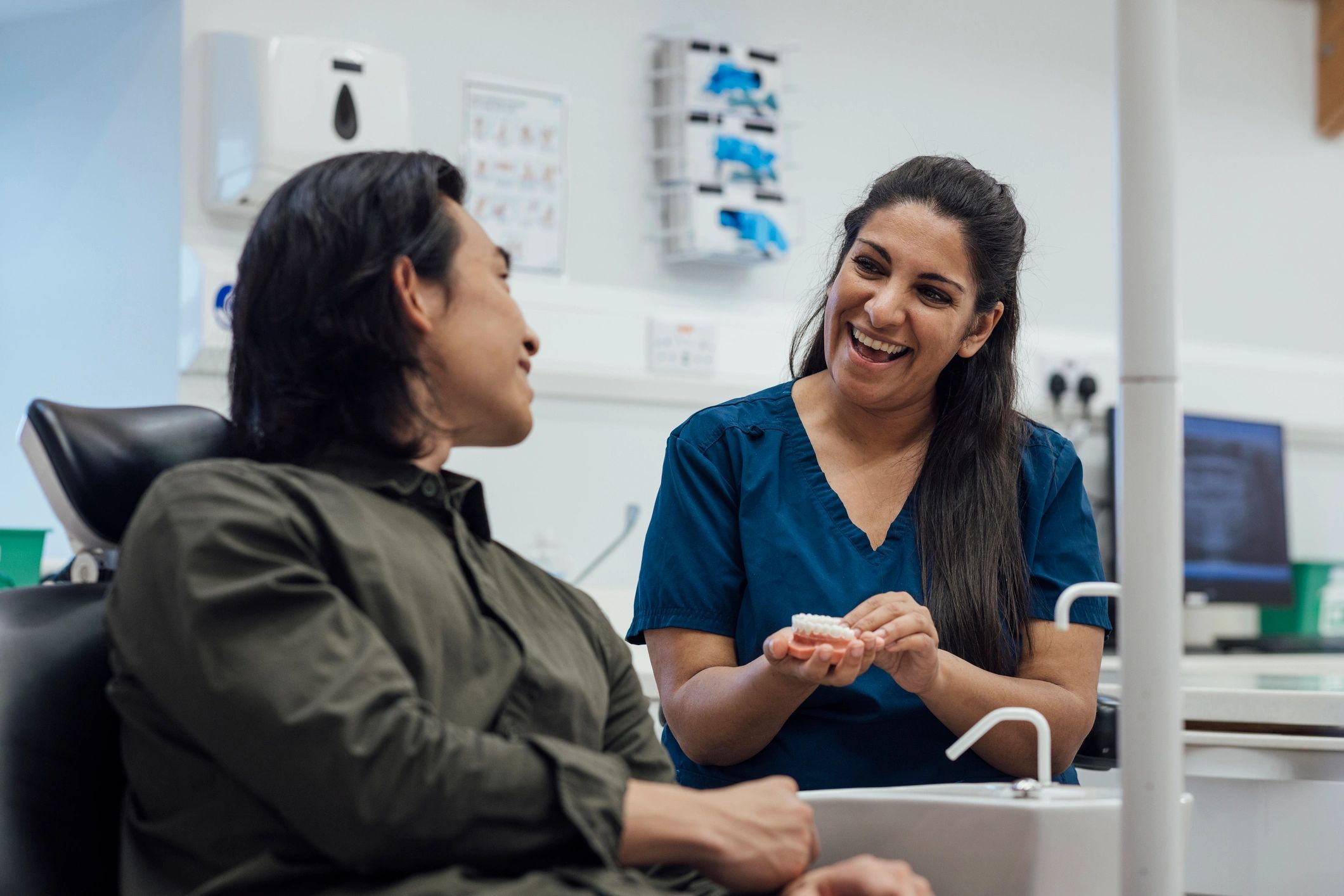 Patient discussing dental treatment options with a dentist