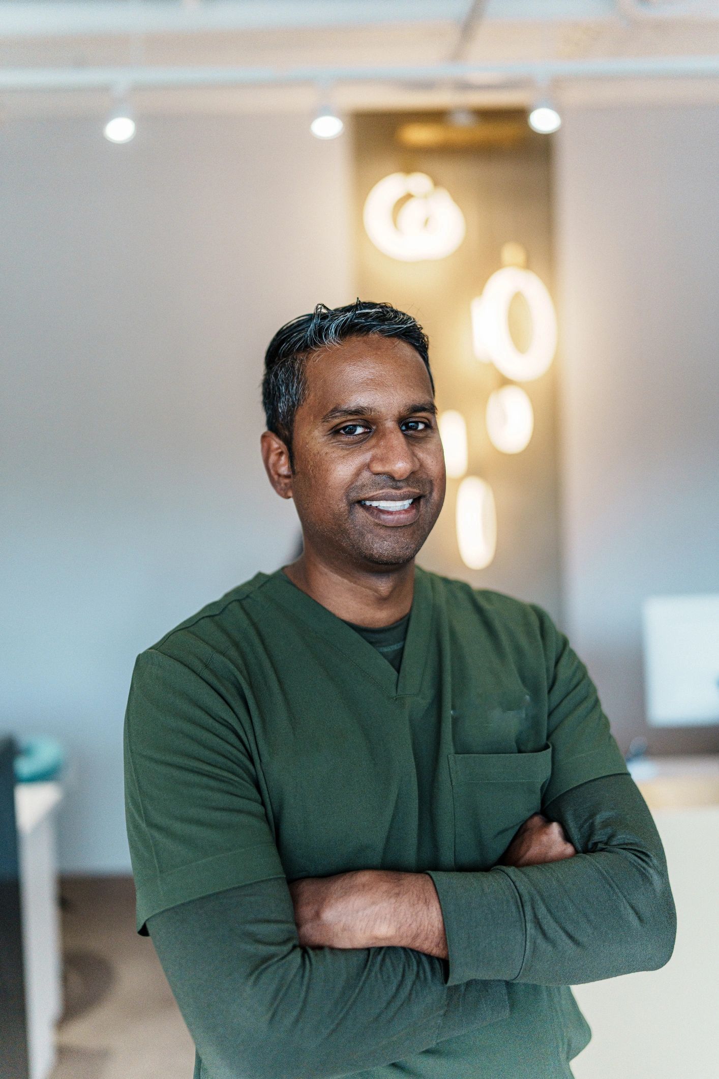 Portrait of Dr. Vidhiyasagar style dentist in clinic