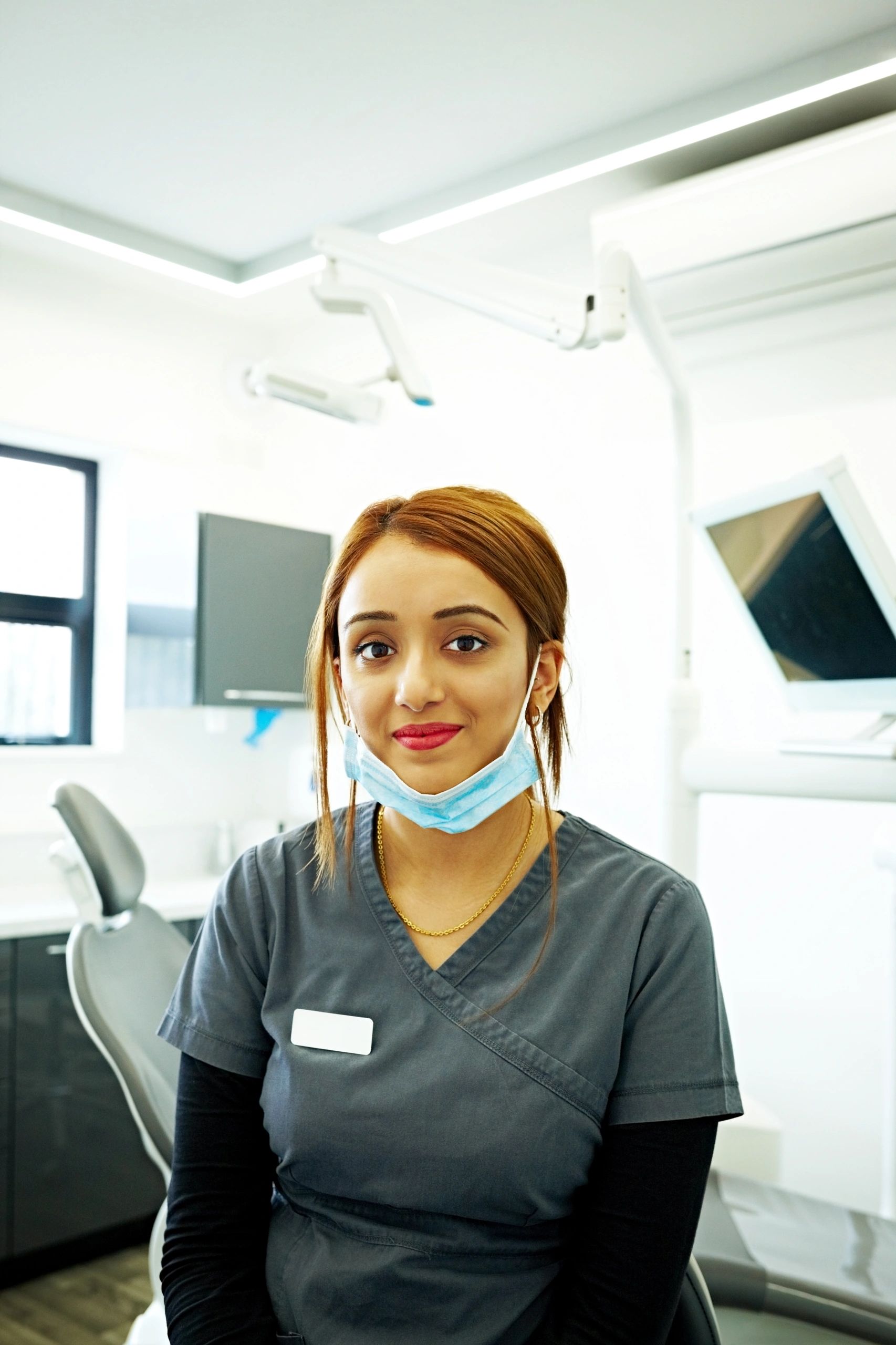 Female dentist portrait in clinic